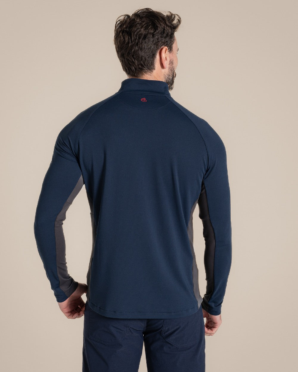 Blue Navy Coloured Craghoppers Mens Nosilife Goswick Half Zip Top on Beige Background 