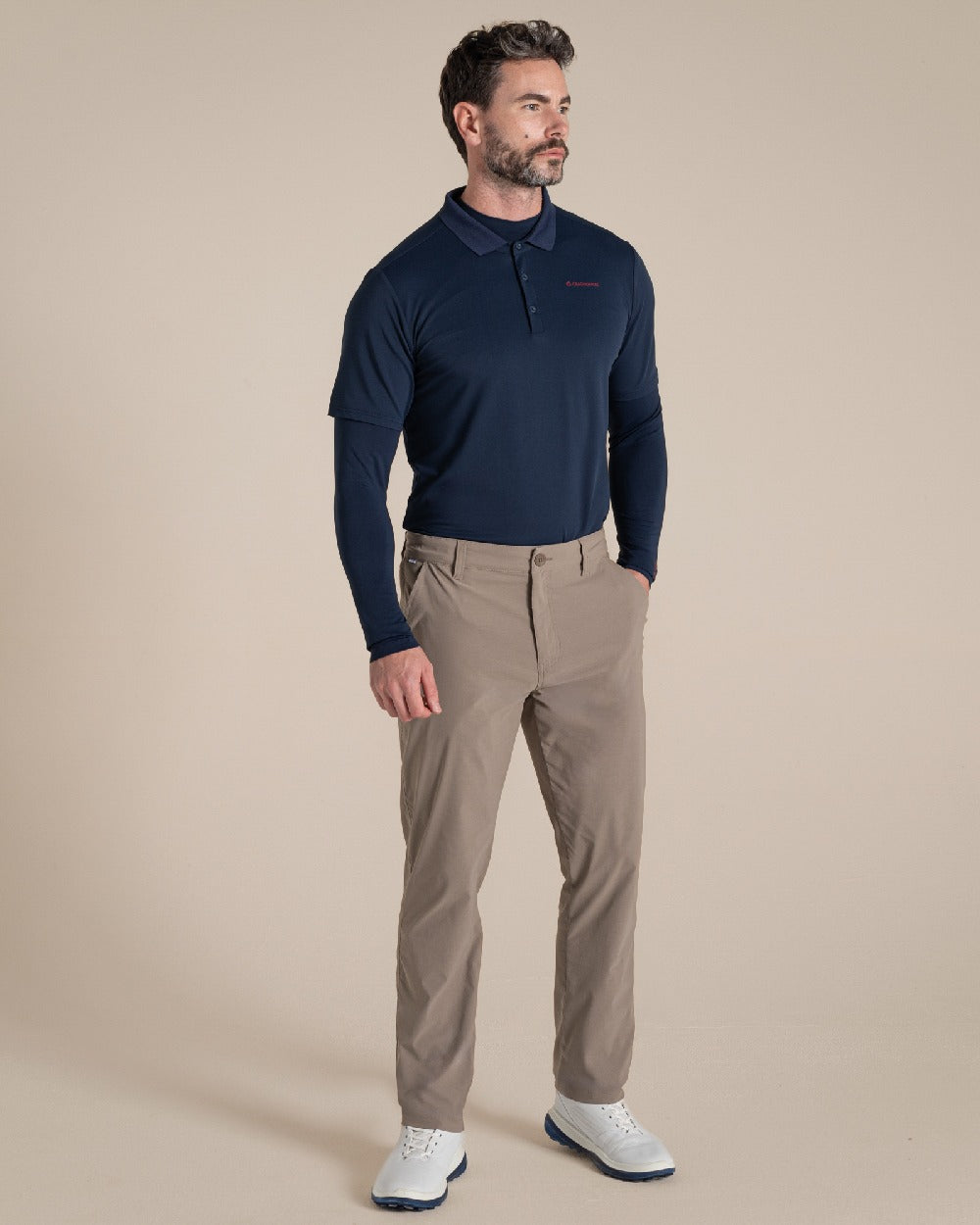 Blue Navy Coloured Craghoppers Mens Nosilife Long Sleeved Neck Top on Beige Background 