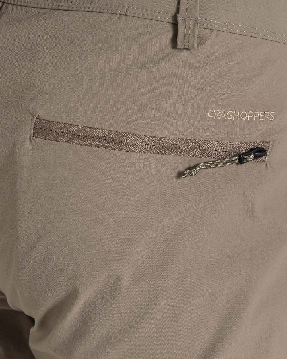 Pebble coloured Craghoppers Mens NosiLife Pro Convertible Trouser III on white background 