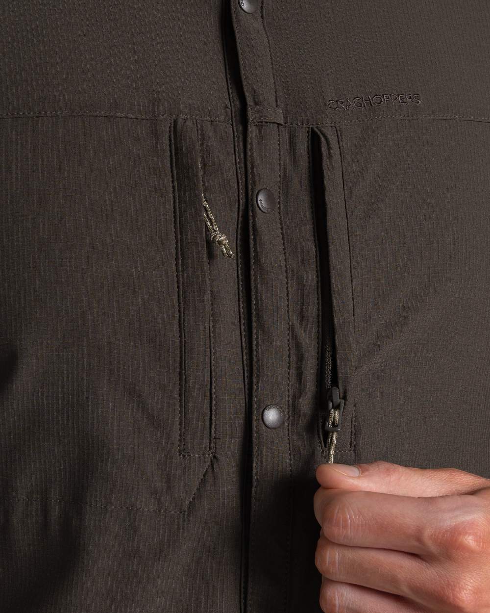 Woodland Green coloured Craghoppers Mens NosiLife Pro Long Sleeved Shirt V on white background 