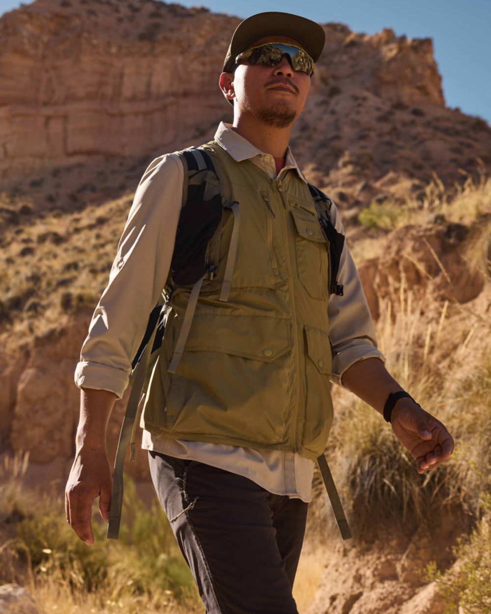 Cardamon coloured Craghoppers Mens NosiLife Sebou Gilet on mountain background 