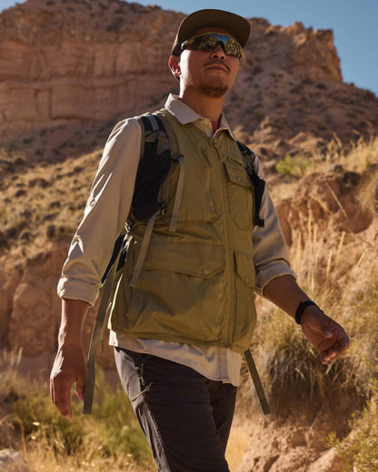 Cardamon coloured Craghoppers Mens NosiLife Sebou Gilet on mountain background 