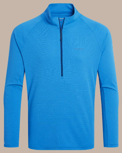 Azure Sky coloured Craghoppers Mens NosiLife SolarShield+ Half Zip Top on beige background 