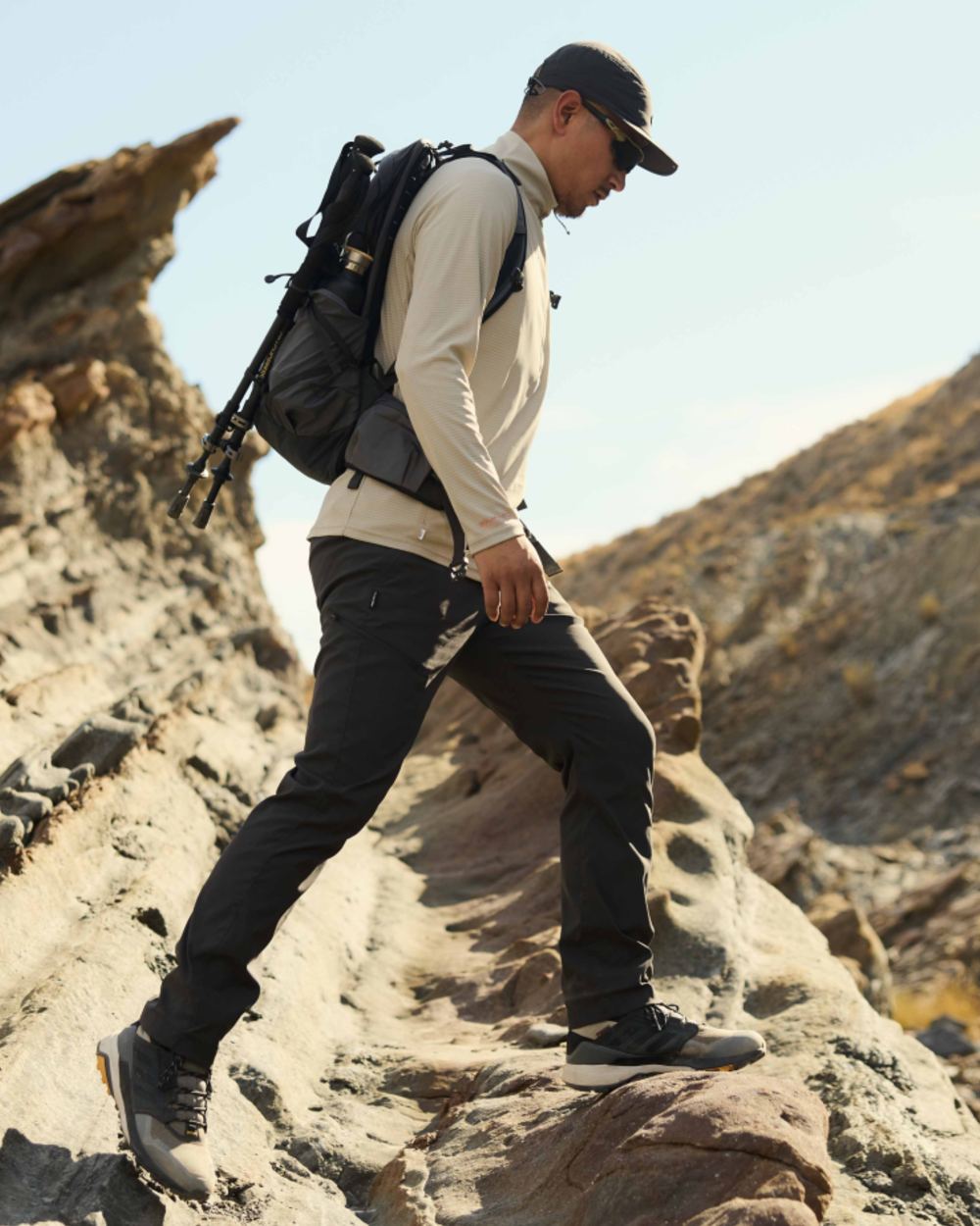 Parchment coloured Craghoppers Mens NosiLife SolarShield+ Half Zip Top on mountain background 