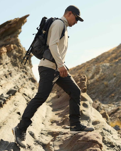 Parchment coloured Craghoppers Mens NosiLife SolarShield+ Half Zip Top on mountain background 