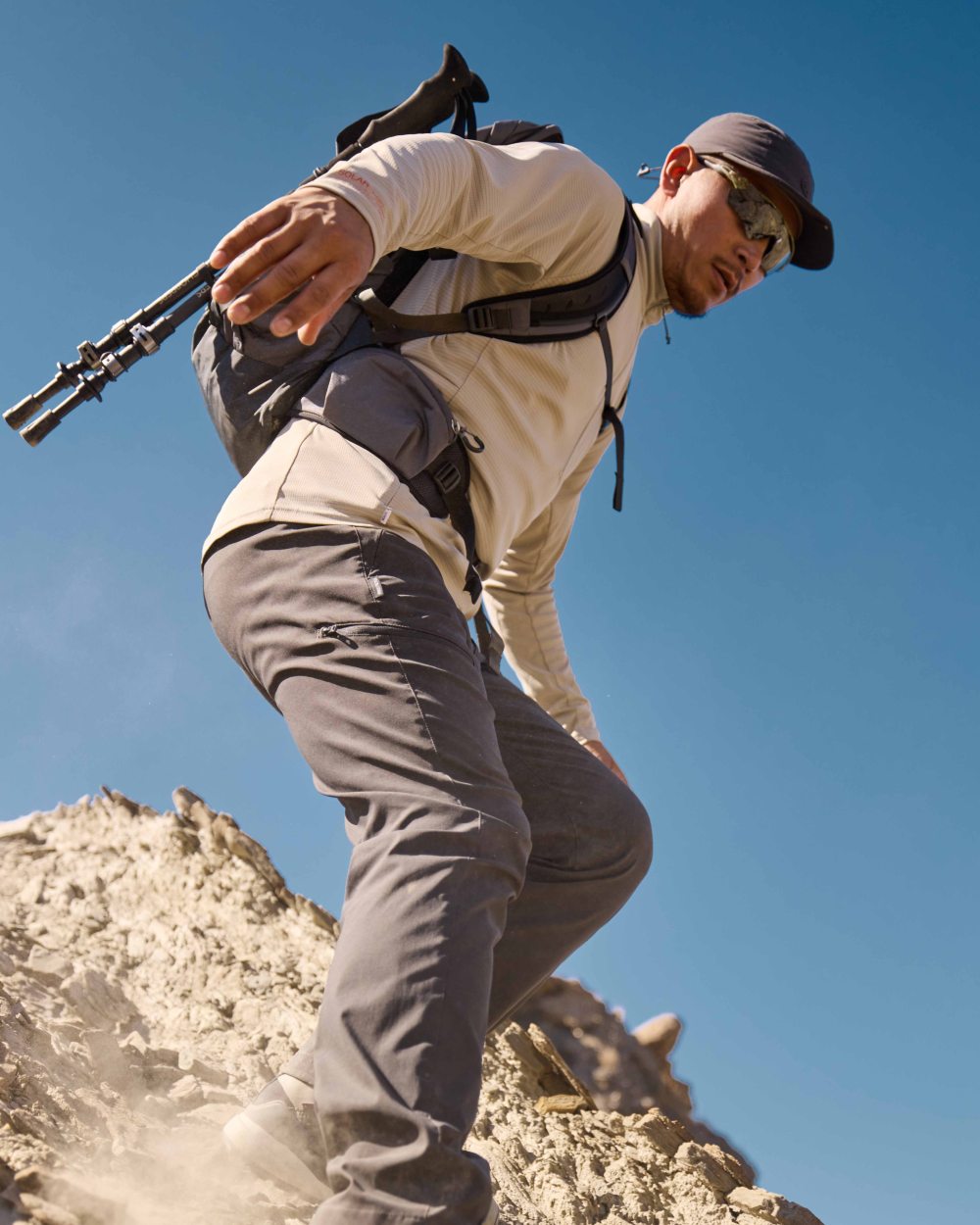 Parchment coloured Craghoppers Mens NosiLife SolarShield+ Half Zip Top on mountain background 