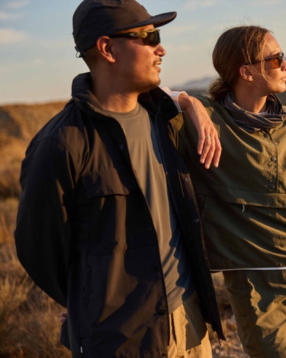 Dark Pewter coloured Craghoppers Mens NosiLife SolarShield+ Long Sleeved T-Shirt on mountain background 