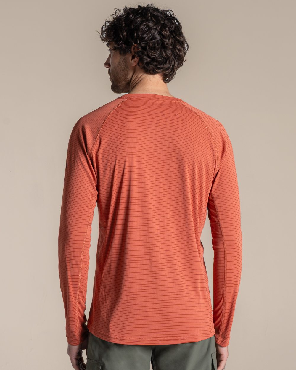 Dark Sahara coloured Craghoppers Mens NosiLife SolarShield+ Long Sleeved T-Shirt on beige background 