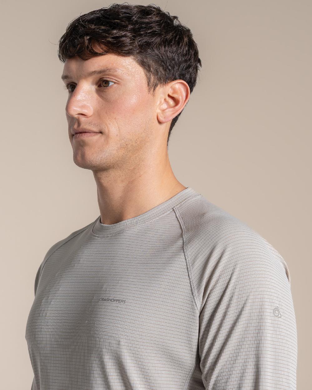 Parchment coloured Craghoppers Mens NosiLife SolarShield+ Long Sleeved T-Shirt on beige background 