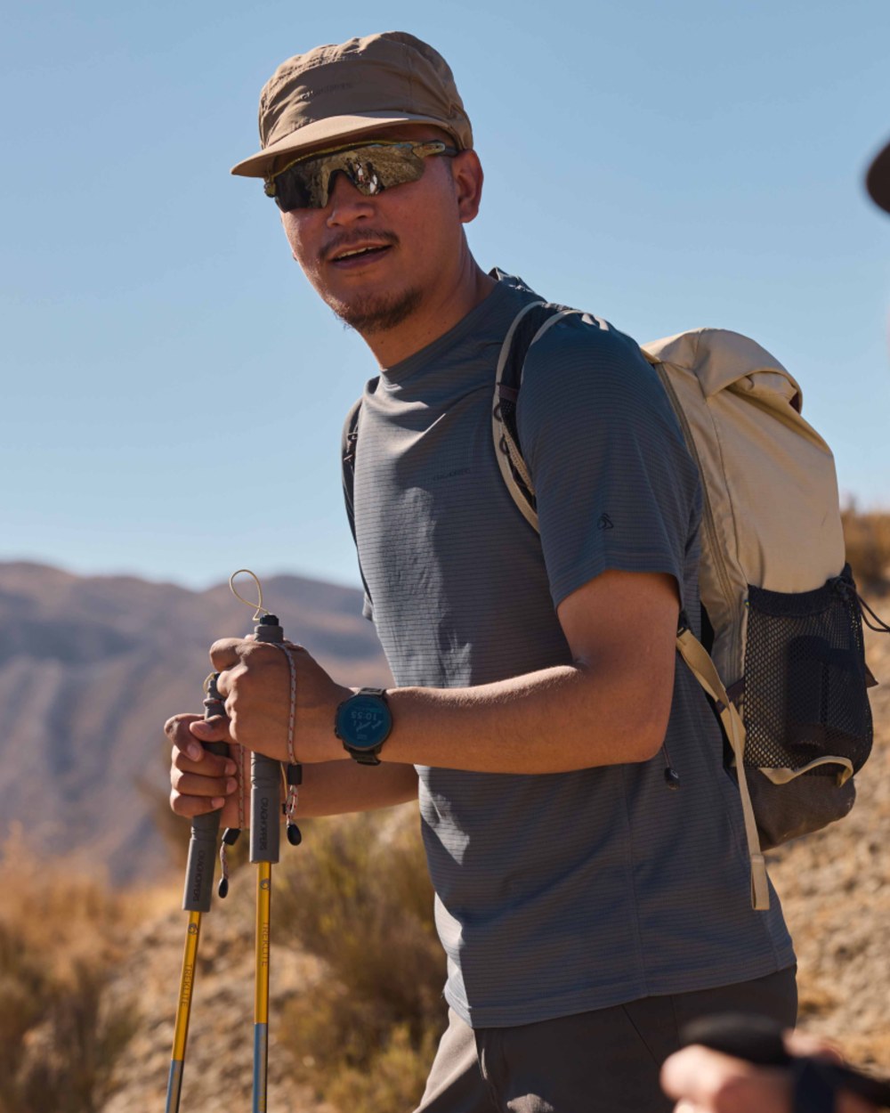 Dark Pewter coloured Craghoppers Mens NosiLife SolarShield+ Short Sleeved T-Shirt on mountain background 