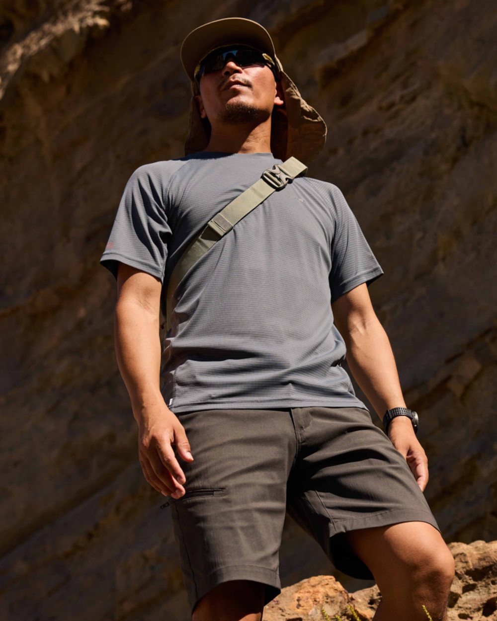 Dark Pewter coloured Craghoppers Mens NosiLife SolarShield+ Short Sleeved T-Shirt on mountain background 