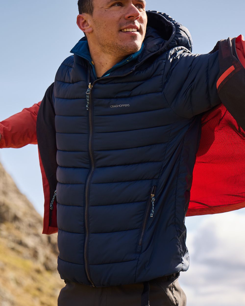 Dark Navy coloured Craghoppers Mens Ponsa Waterproof Jacket on mountain background 