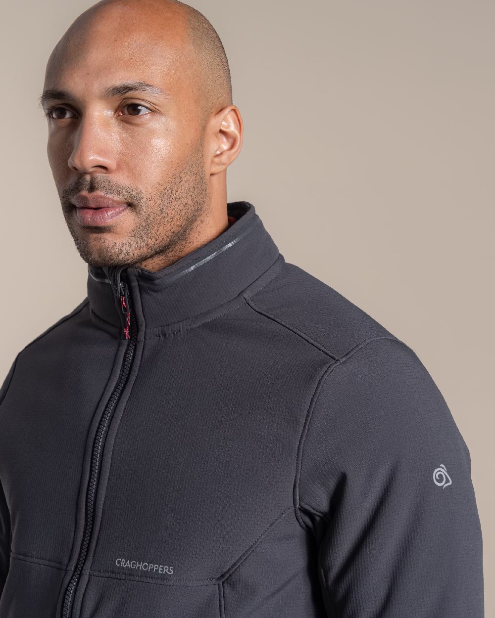 Dark Iron coloured Craghoppers Mens Selside Jacket on beige background 