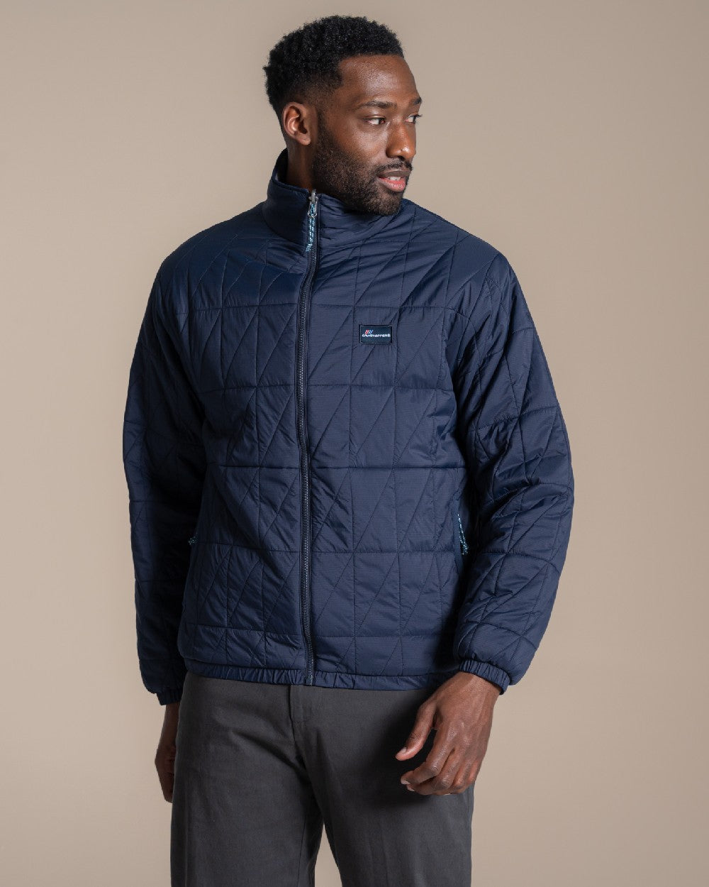 Blue Navy coloured Craghoppers Mens Stuo Jacket on beige background 