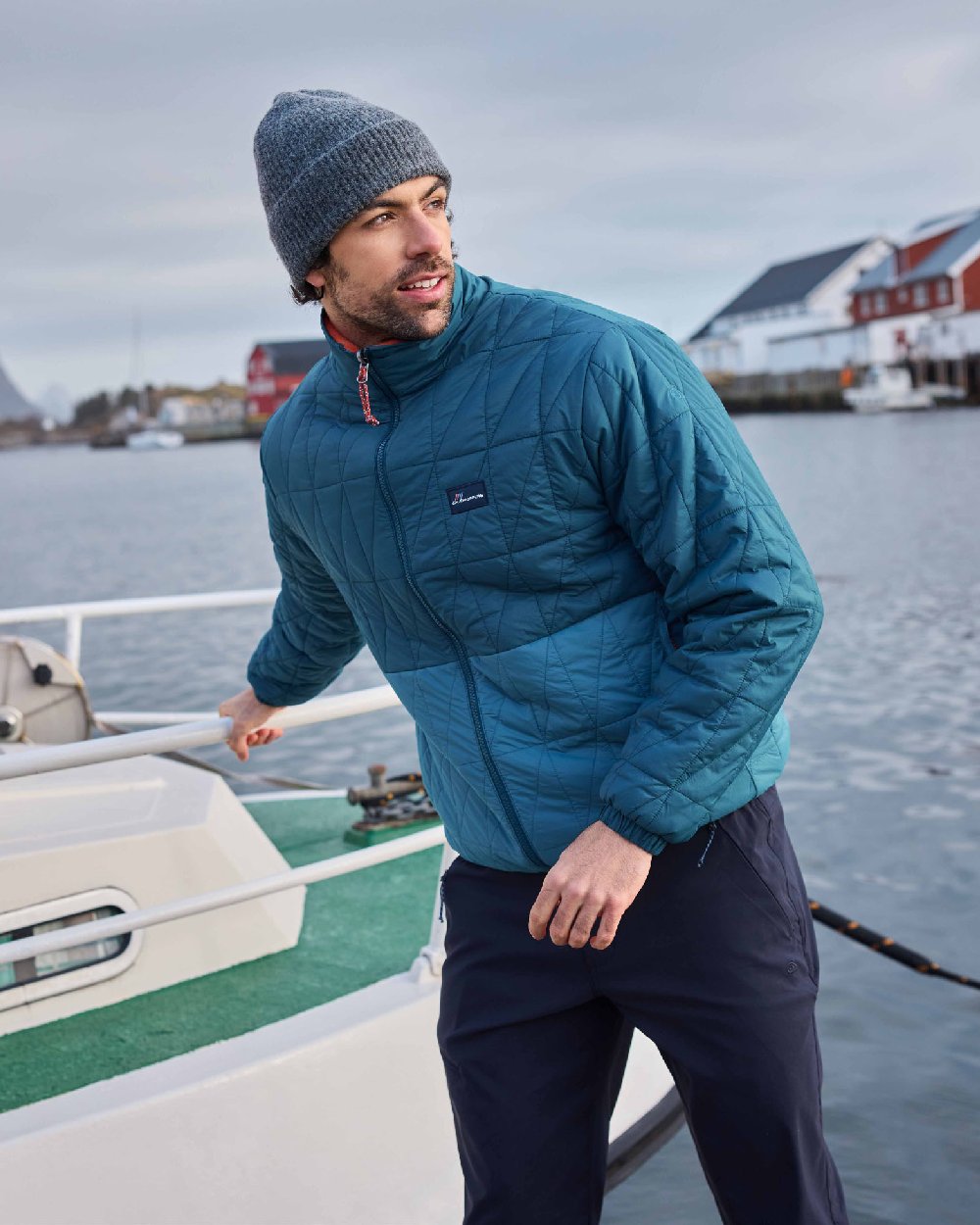 Dark Aegean Blue Winter Storm coloured Craghoppers Stuo Jacket on forest background 