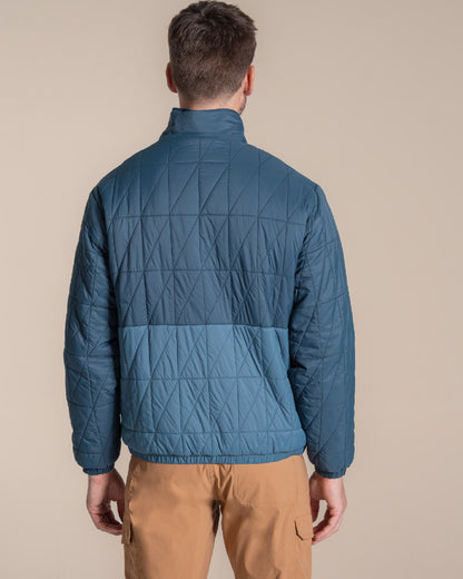 Dark Aegean Blue Winter Storm coloured Craghoppers Stuo Jacket on beige background 
