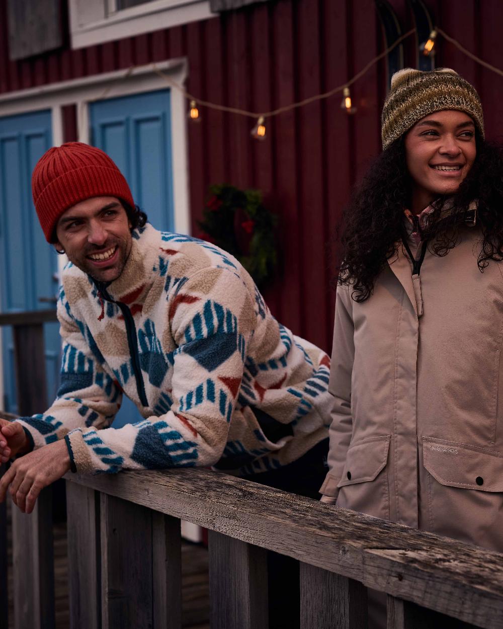 River Blue coloured Craghoppers Mens Tatton II Half Zip on Rustic Cabin background 