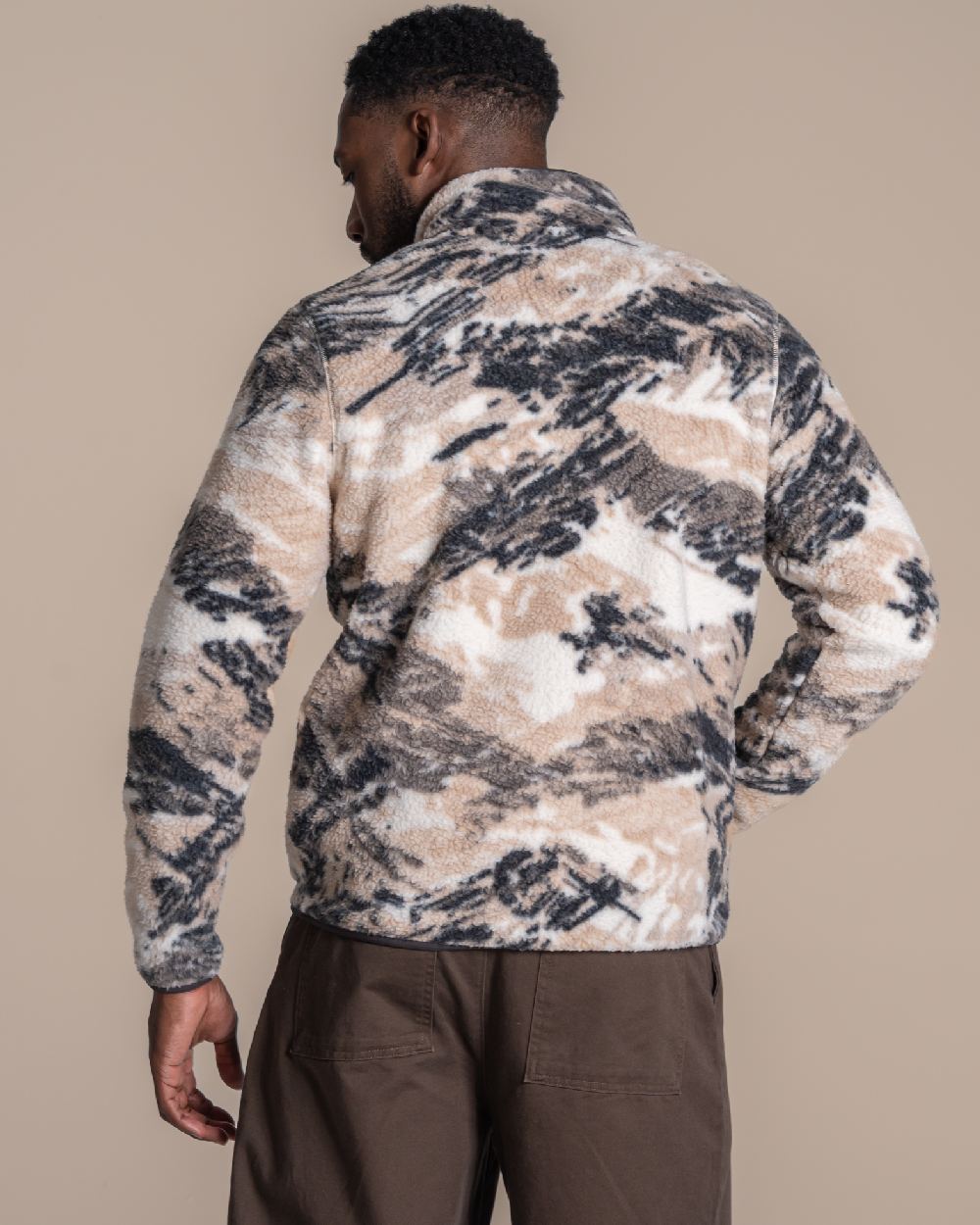 Dark Iron coloured Craghoppers Mens Tatton II Half Zip on beige background 