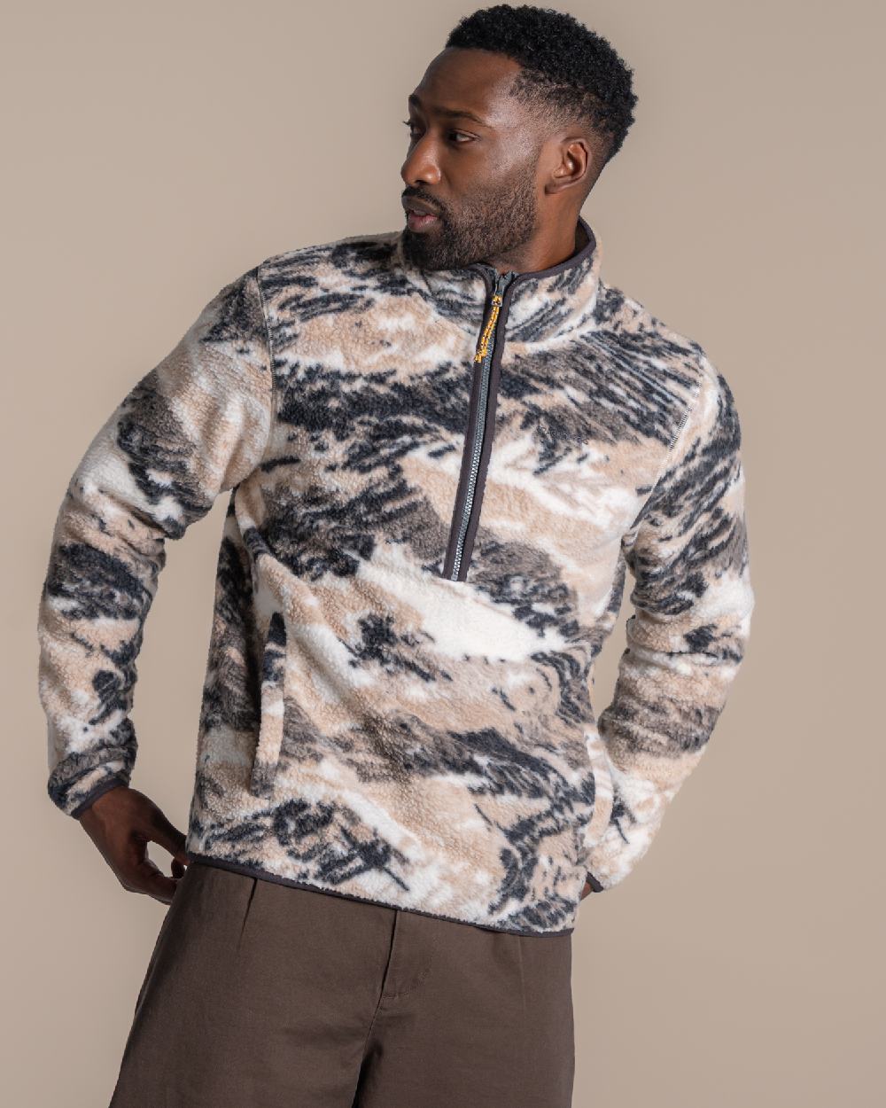 Dark Iron coloured Craghoppers Mens Tatton II Half Zip on beige background 