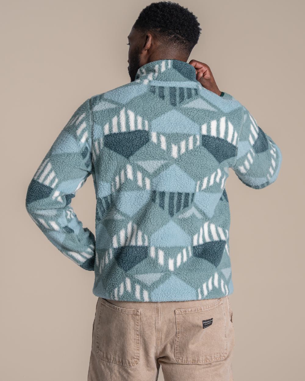 Green Ridge coloured Craghoppers Mens Tatton II Half Zip on beige background 