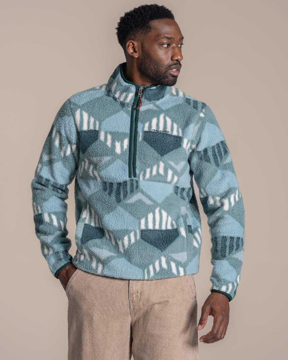 Green Ridge coloured Craghoppers Mens Tatton II Half Zip on beige background 