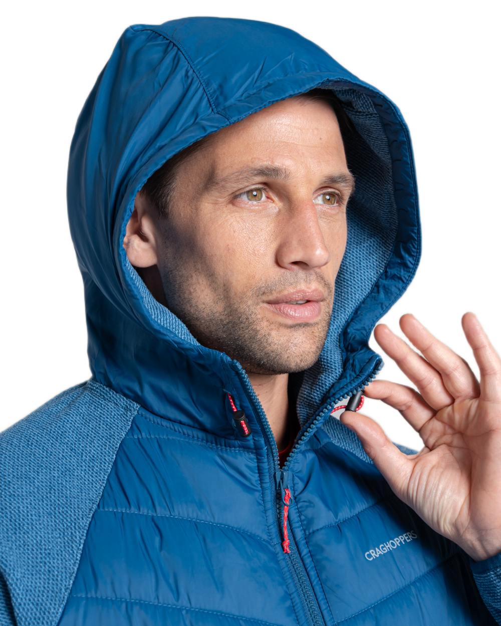 Poseidon Blue coloured Craghoppers Mens Vamos Hybrid Insulating Jacket  on white background 