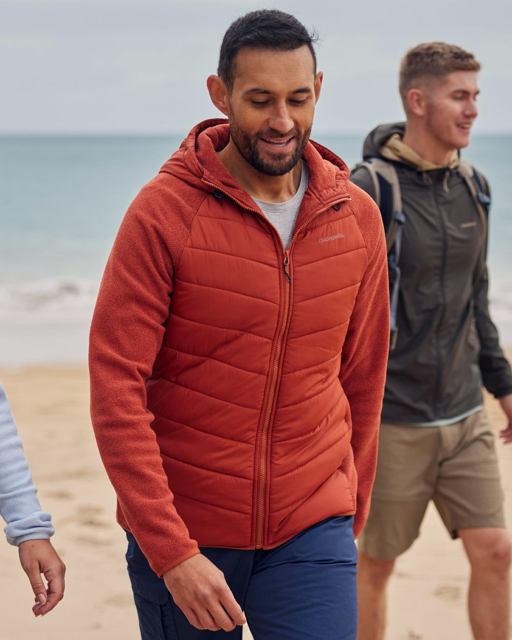 Red Beach coloured Craghoppers Mens Vamos Hybrid Insulating Jacket  on beach background 