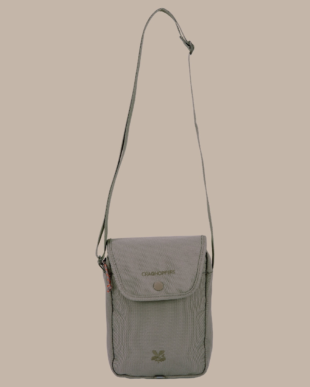 Vert Coloured Craghoppers National Trust Kiwi Crossbody on Beige Background 