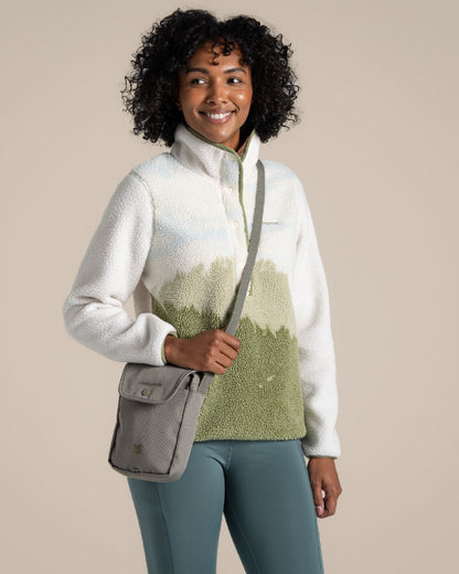 Vert Coloured Craghoppers National Trust Kiwi Crossbody on Beige Background 