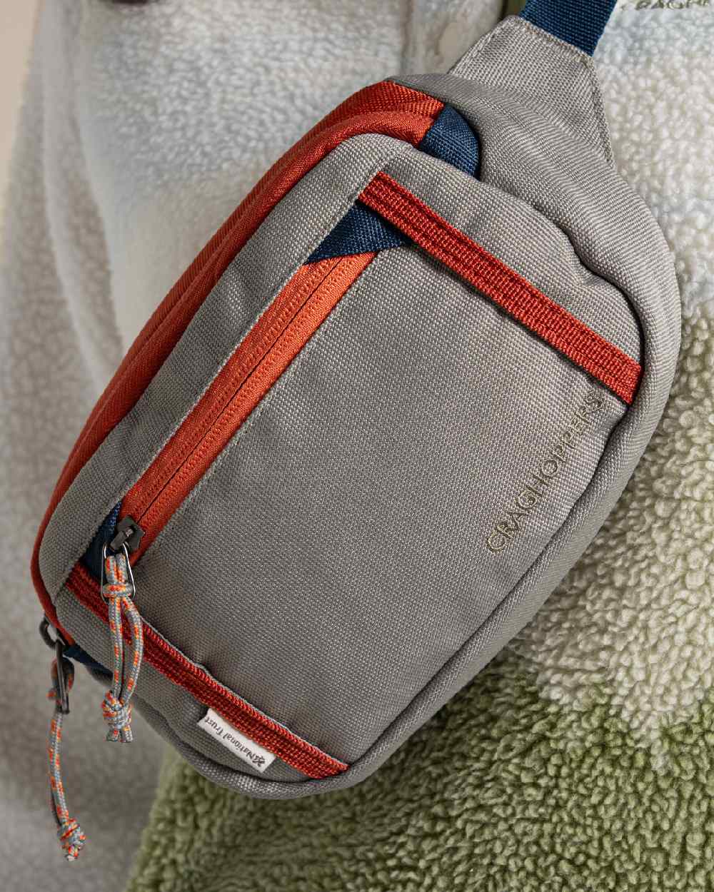 Vert Coloured Craghoppers National Trust Kiwi Waistpack on Beige Background 