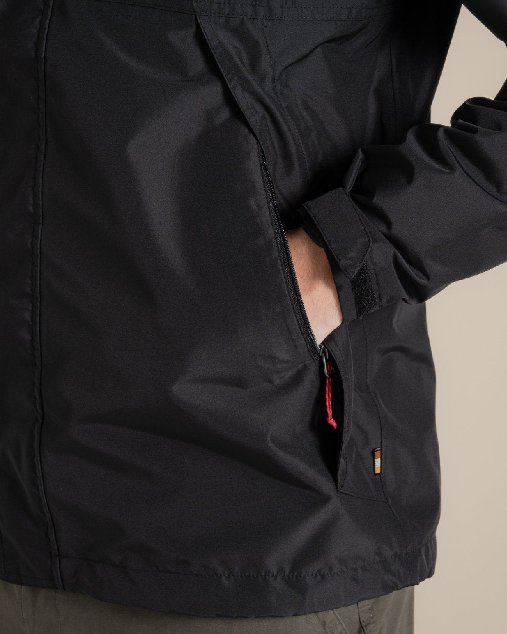 Black coloured Craghoppers Ossus Jacket on beige background 