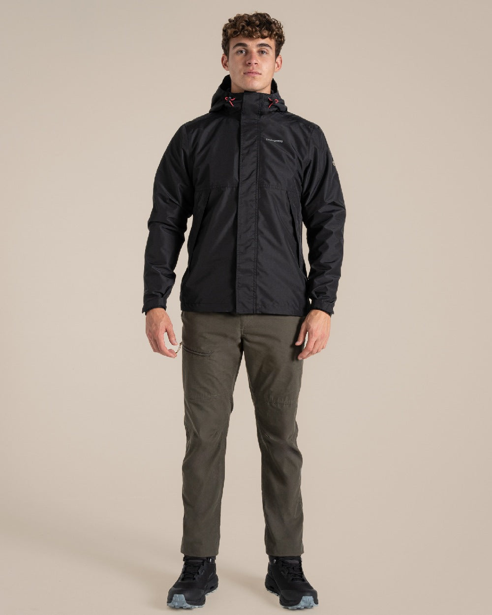 Black coloured Craghoppers Ossus Jacket on beige background 