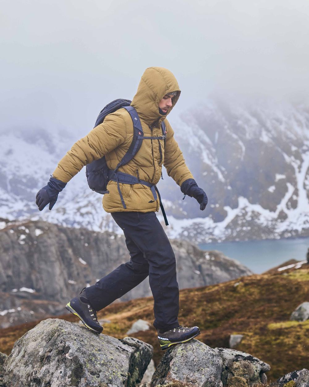 Black colour Craghoppers Steall Pro Thermo Waterproof Trouser on forest background 