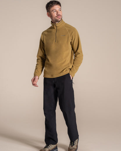 Black colour Craghoppers Steall Pro Thermo Waterproof Trouser on beige background 