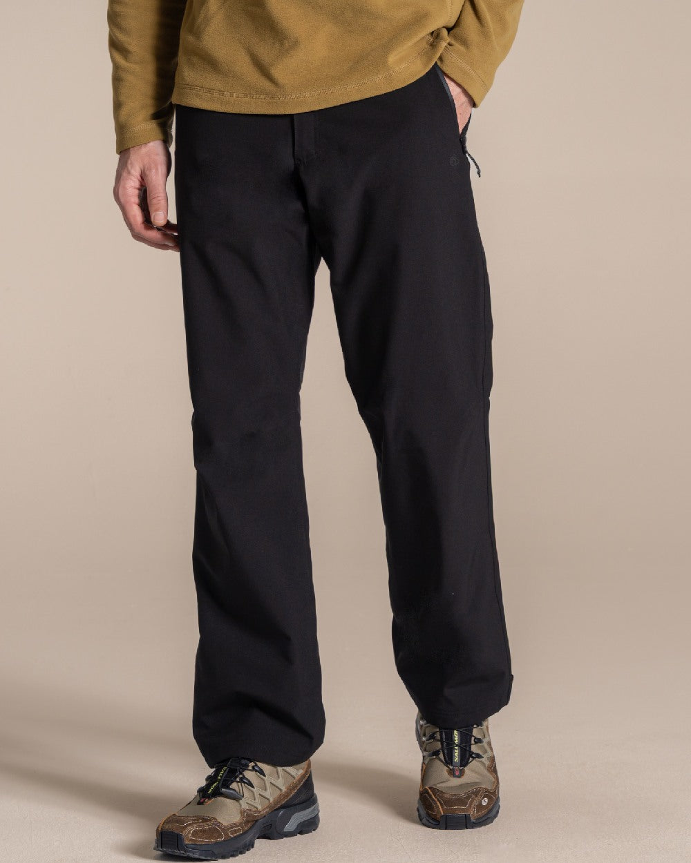 Black colour Craghoppers Steall Pro Thermo Waterproof Trouser on beige background 