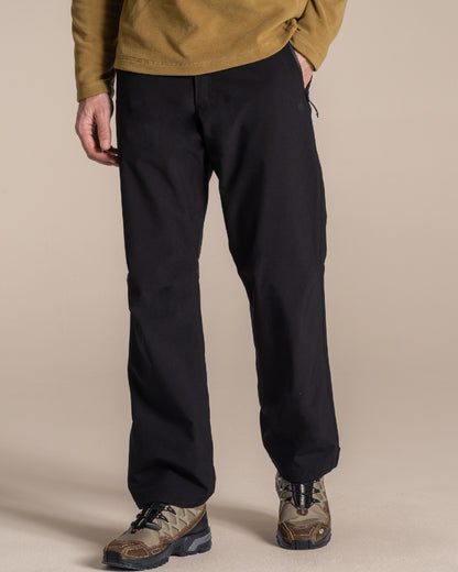 Black colour Craghoppers Steall Pro Thermo Waterproof Trouser on beige background 