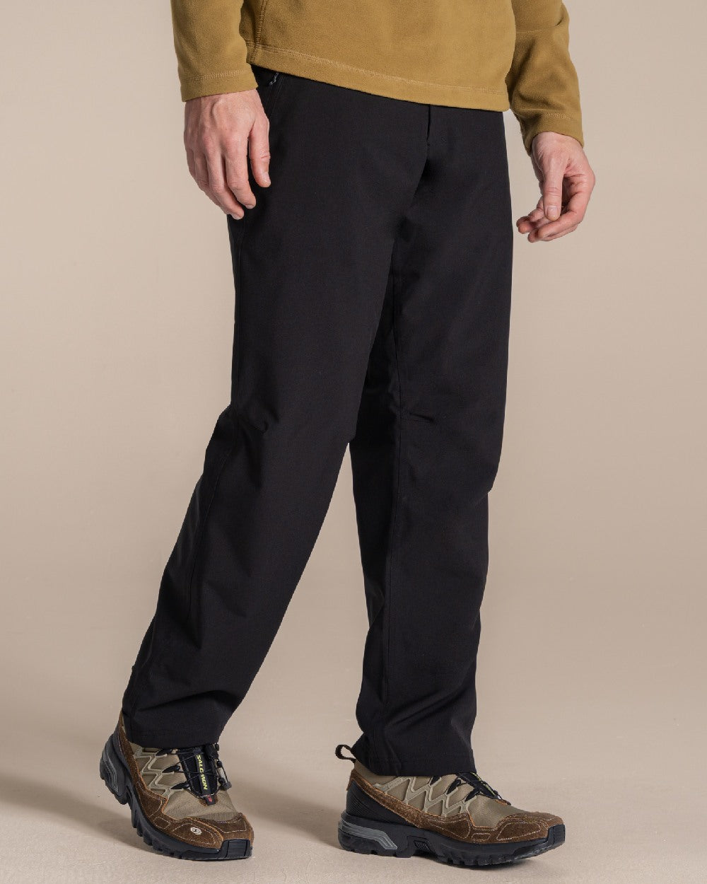 Black colour Craghoppers Steall Pro Thermo Waterproof Trouser on beige background 