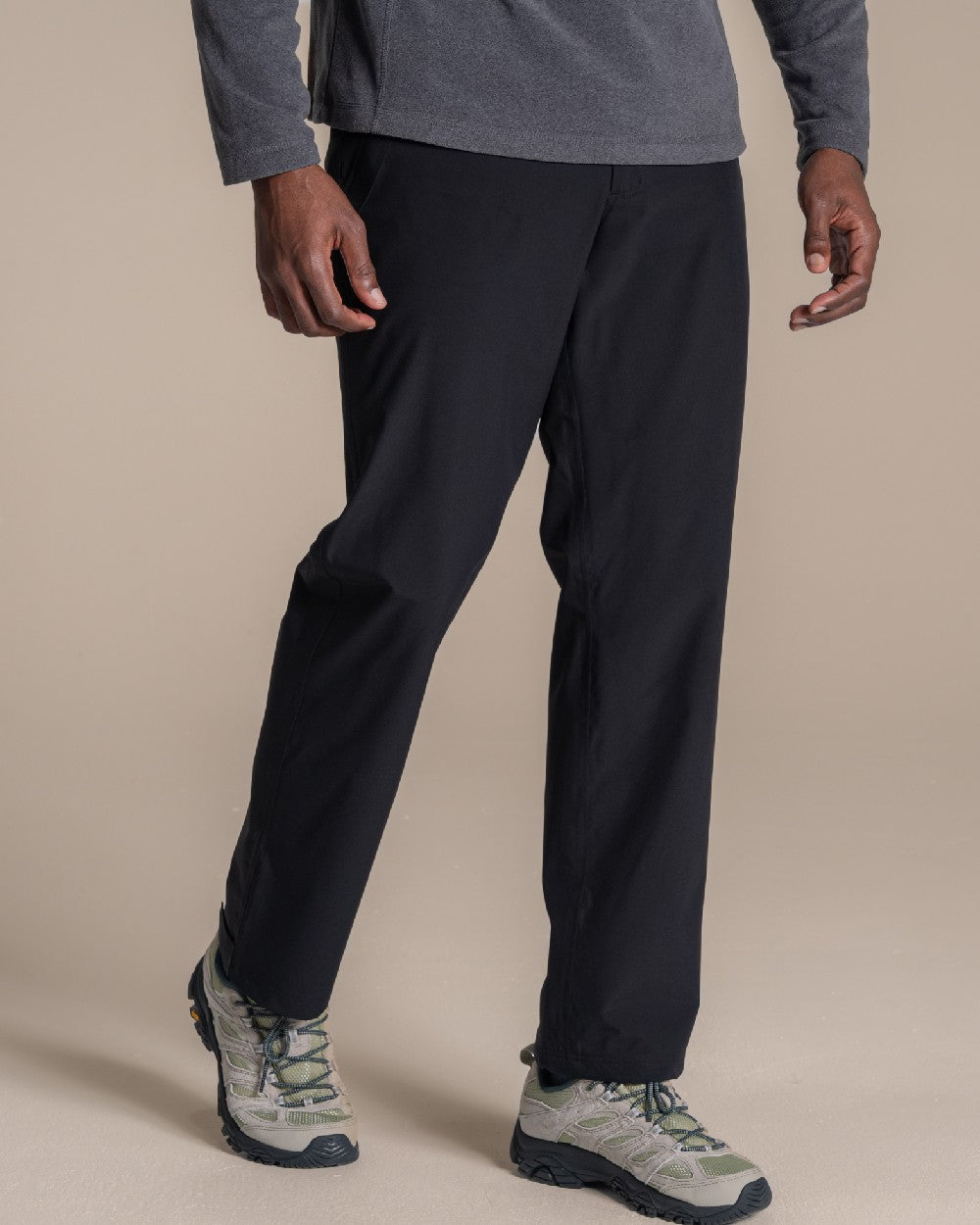 Black coloured Craghoppers Stefan Pro Waterproof Trouser on beige background 