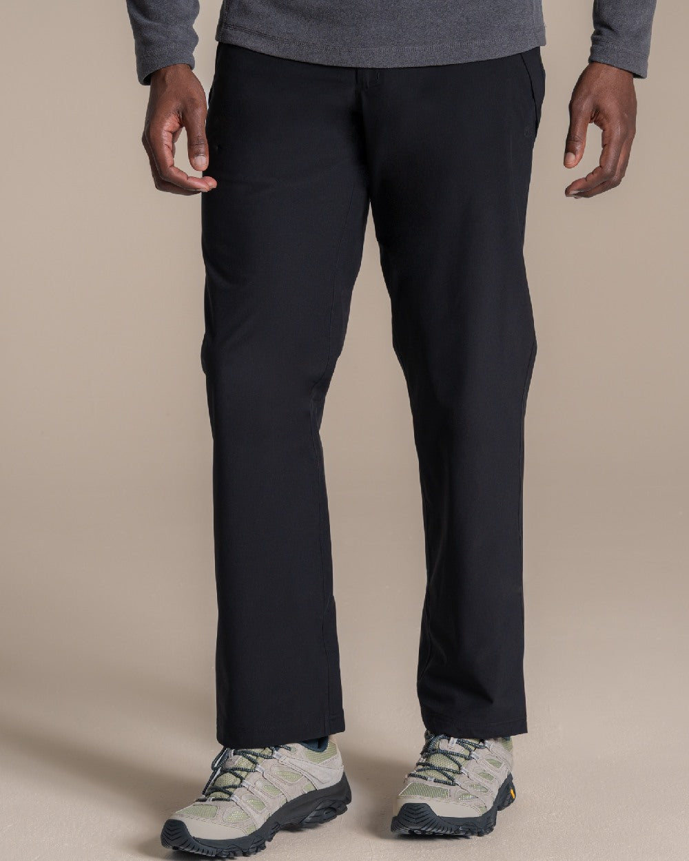 Black coloured Craghoppers Stefan Pro Waterproof Trouser on beige background 