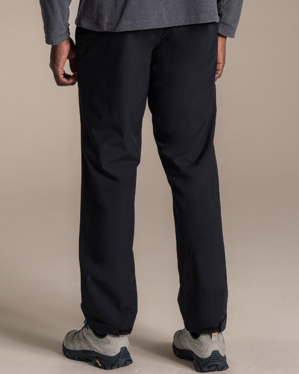 Black coloured Craghoppers Stefan Pro Waterproof Trouser on beige background 