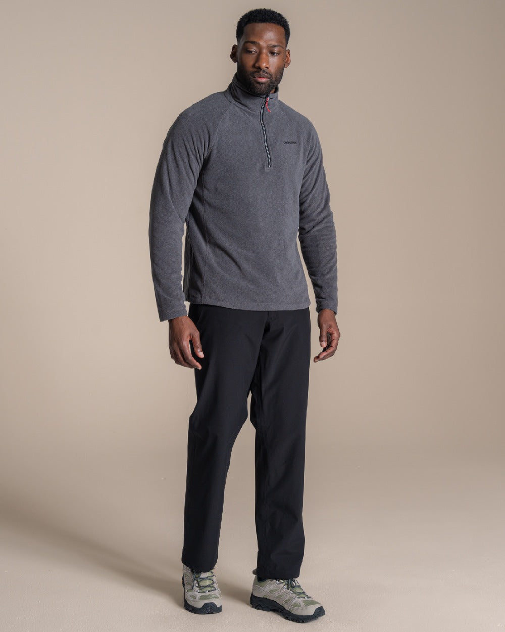 Black coloured Craghoppers Stefan Pro Waterproof Trouser on beige background 