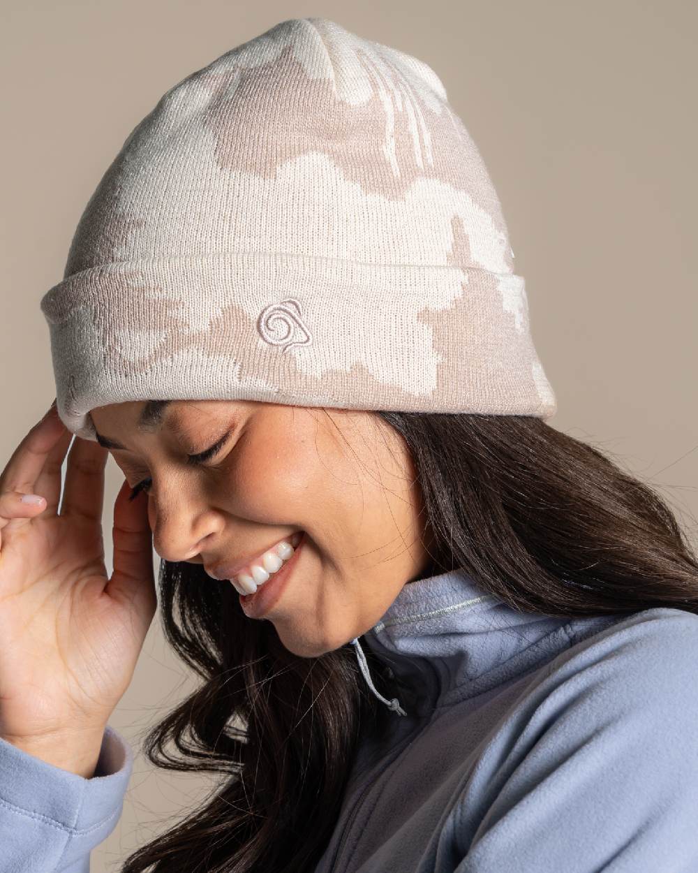 Calico coloured Craghoppers Vervain Hat on beige background 