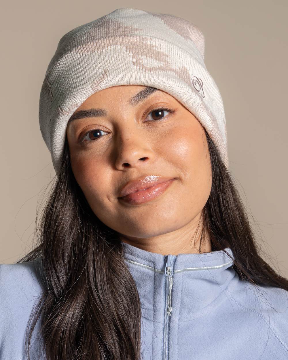 Calico coloured Craghoppers Vervain Hat on beige background 