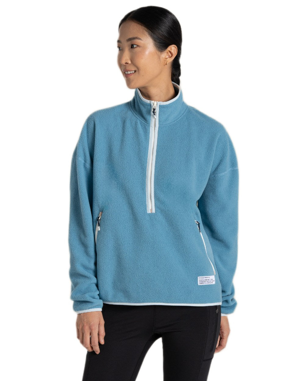 Light Denim coloured Craghoppers Womens CO2 Renu Half Zip Fleece Sweater on white background 