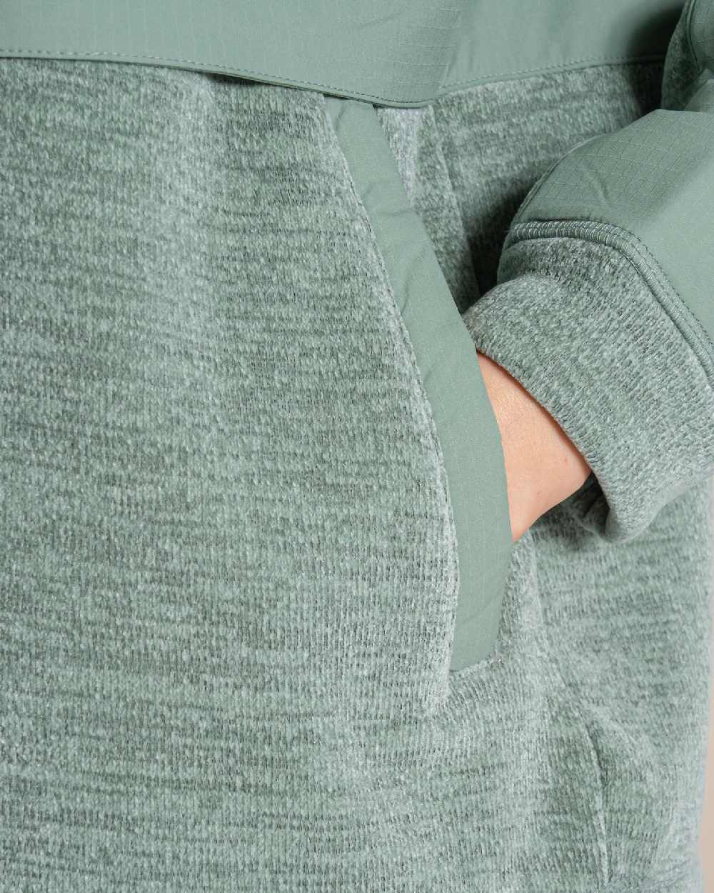 Glacial Green coloured Craghoppers Womens Hanna Hooded Overhead on beige background 
