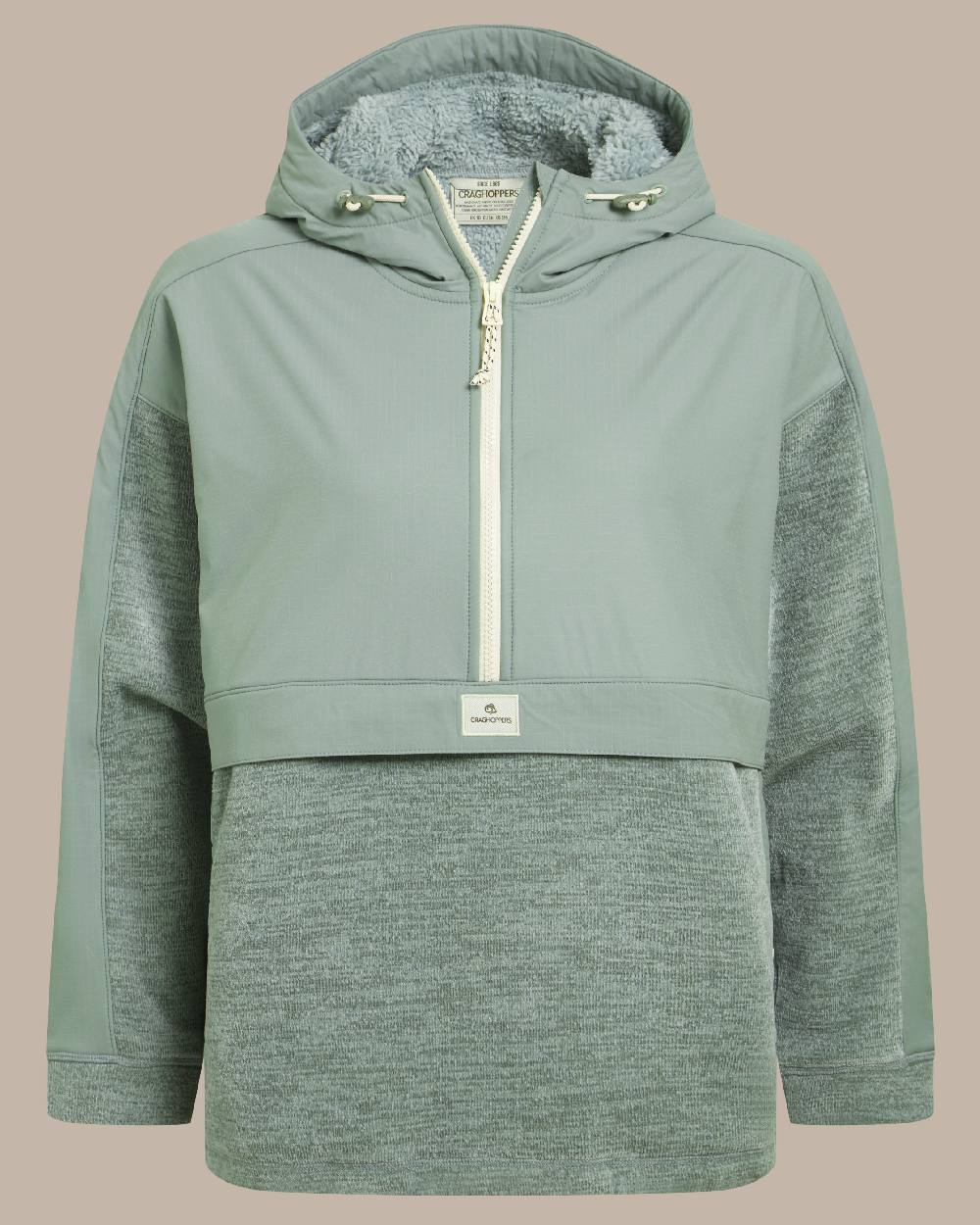 Glacial Green coloured Craghoppers Womens Hanna Hooded Overhead on beige background 