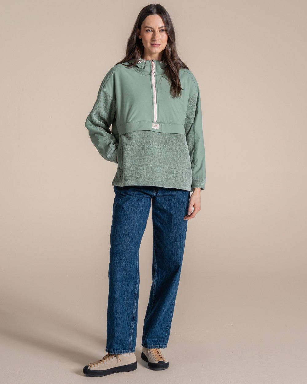 Glacial Green coloured Craghoppers Womens Hanna Hooded Overhead on beige background 