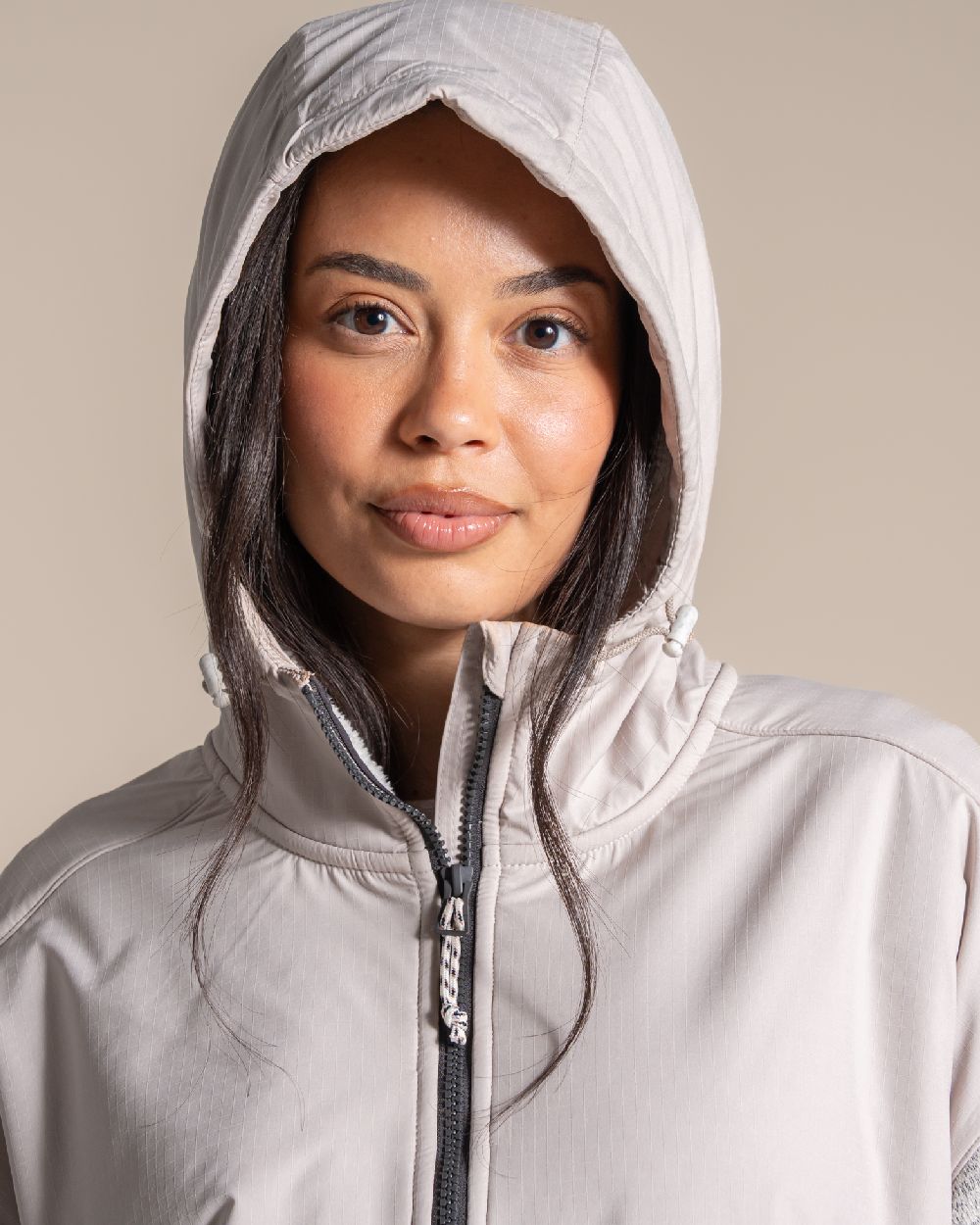 Oyster coloured Craghoppers Womens Hanna Hooded Overhead on beige background 