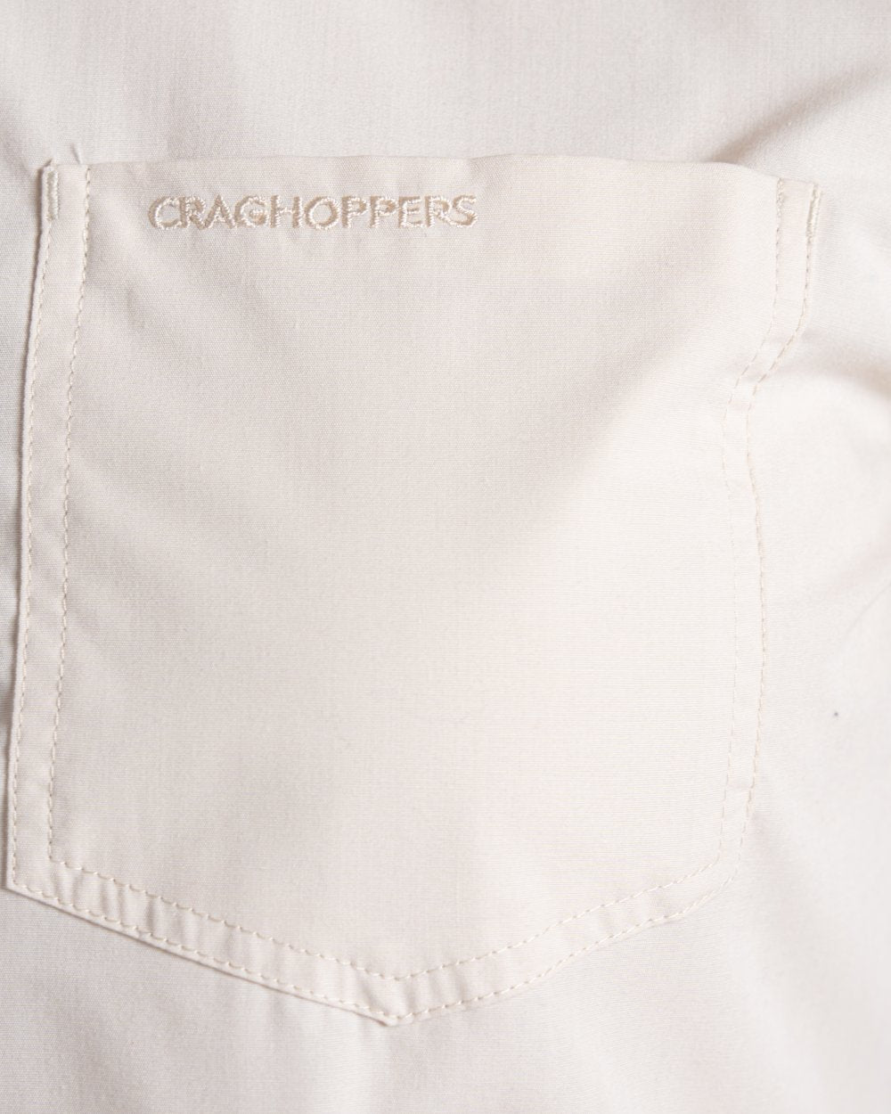 Stone coloured Craghoppers Womens Kiwi III Long Sleeved Shirt on white background 