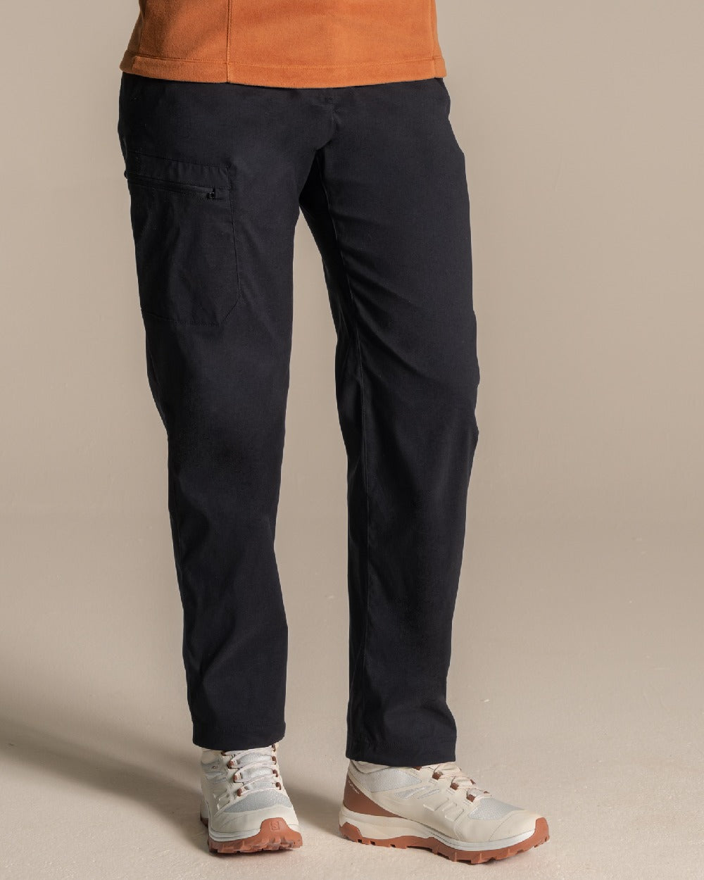 Black Coloured Womens KiwiPro Barrel Trouser on Beige Background 